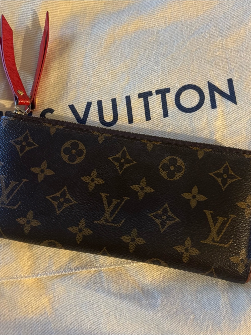 Authentic Louis Vuitton Adele Monogram Canvas Wallet with Red Leather Zip Pull